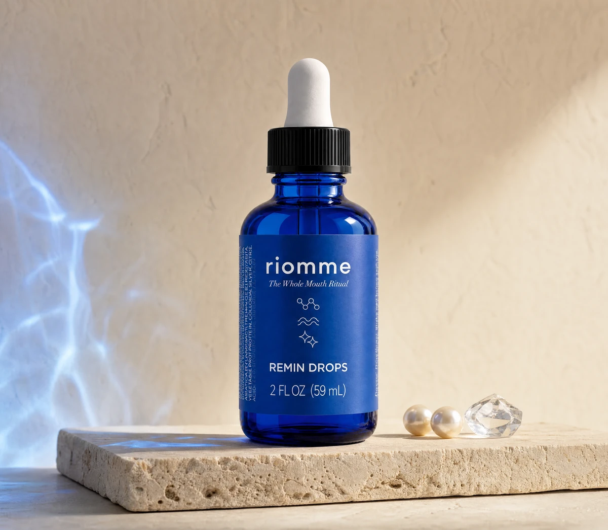 Remin Drops on a stone slab with pearls
