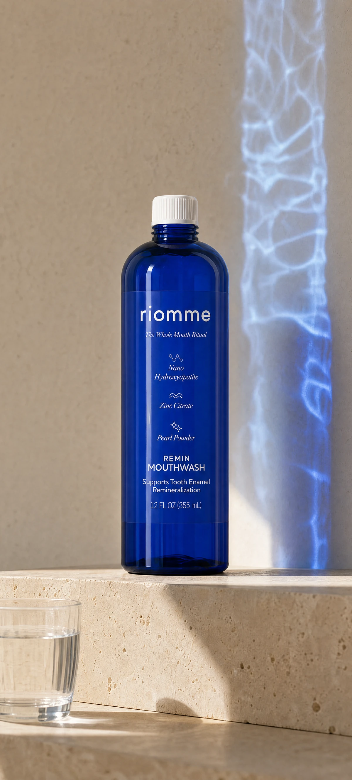 Remin Mouthwash on a stone step with blue water light